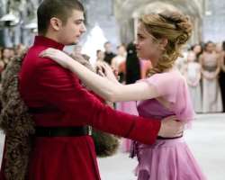 According to books, her Yule Ball dress was floaty made with periwinkle-blue material, but in film she was shown in a purple and pink gown. 